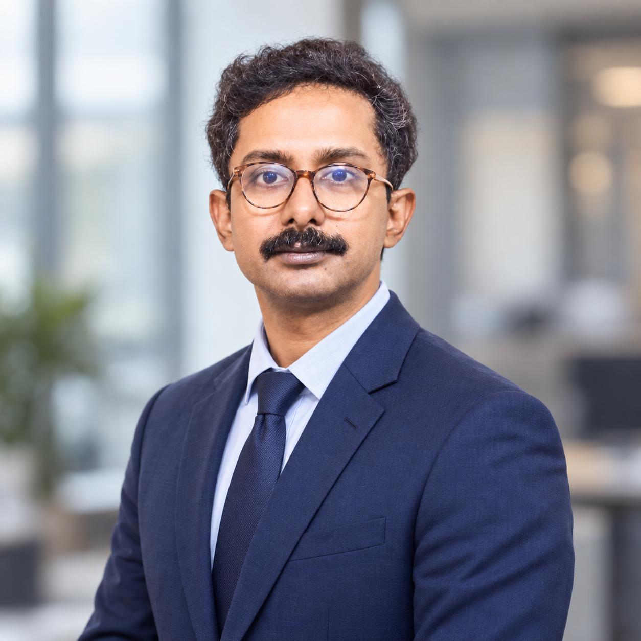 Dr. Mainak Palit
